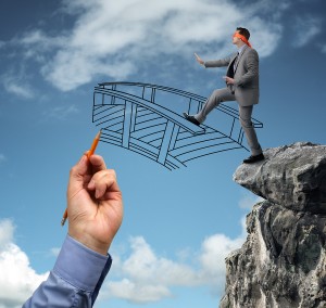 Businessman in a blindfold stepping off a cliff ledge with giant